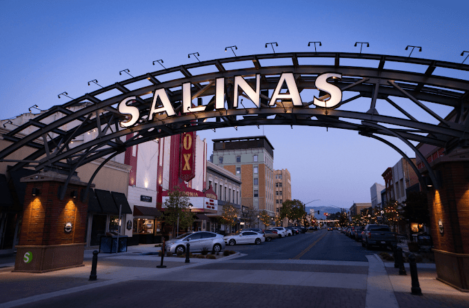 Salinas downtown arch at twilight with city street and buildings