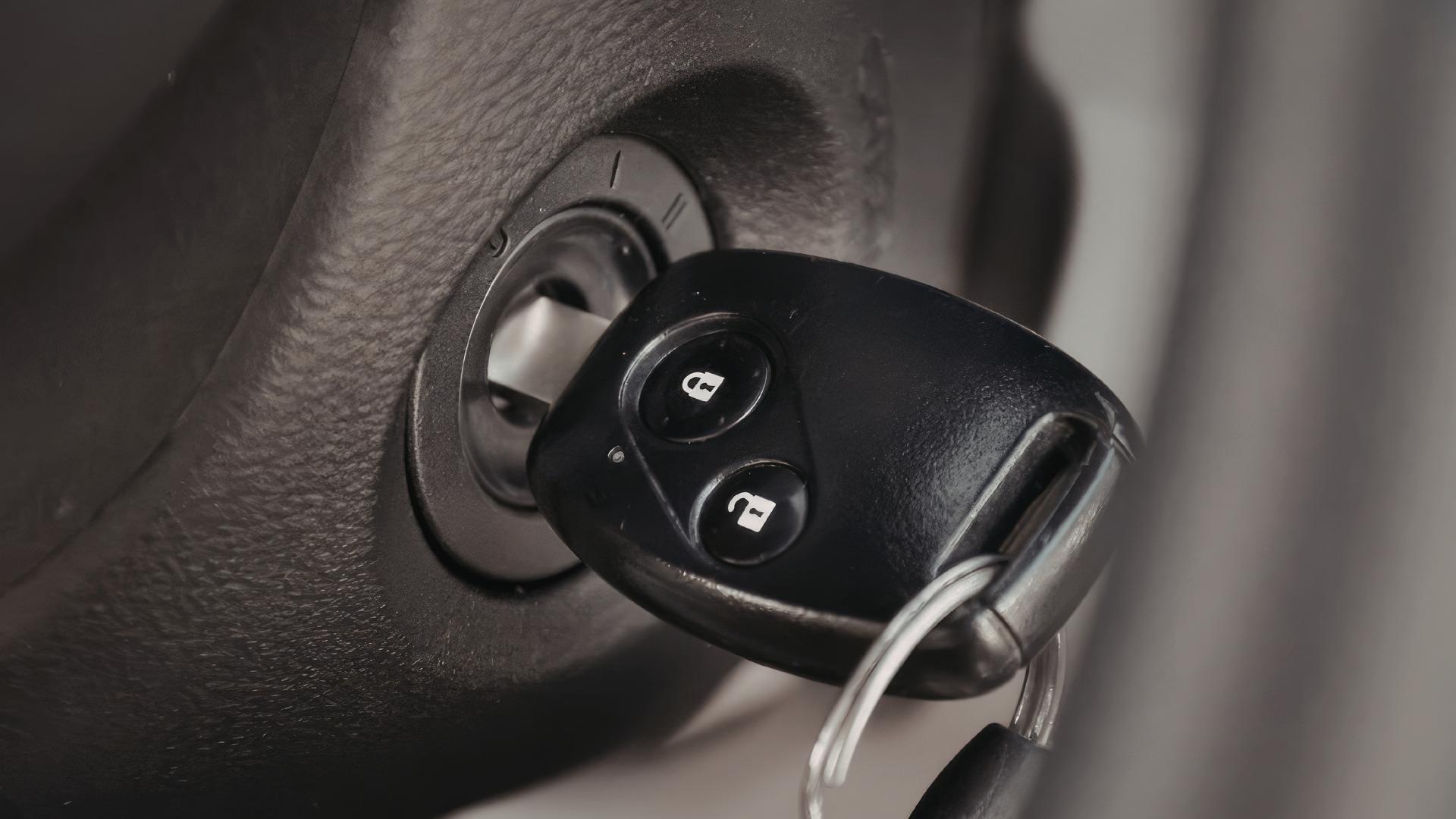 Close-up of a car ignition cylinder and key mechanism