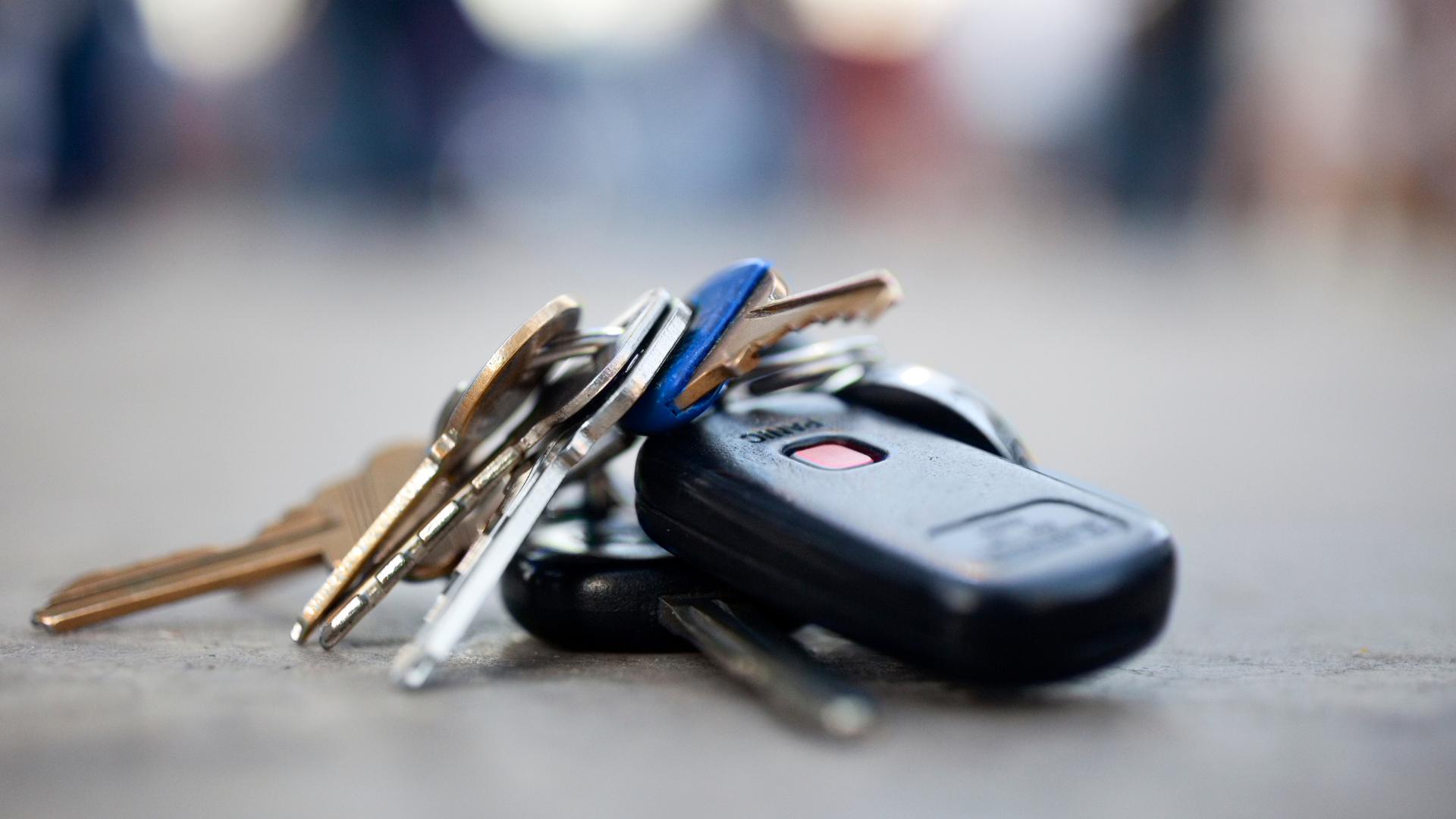 Lost car key on the ground next to a vehicle in Salinas