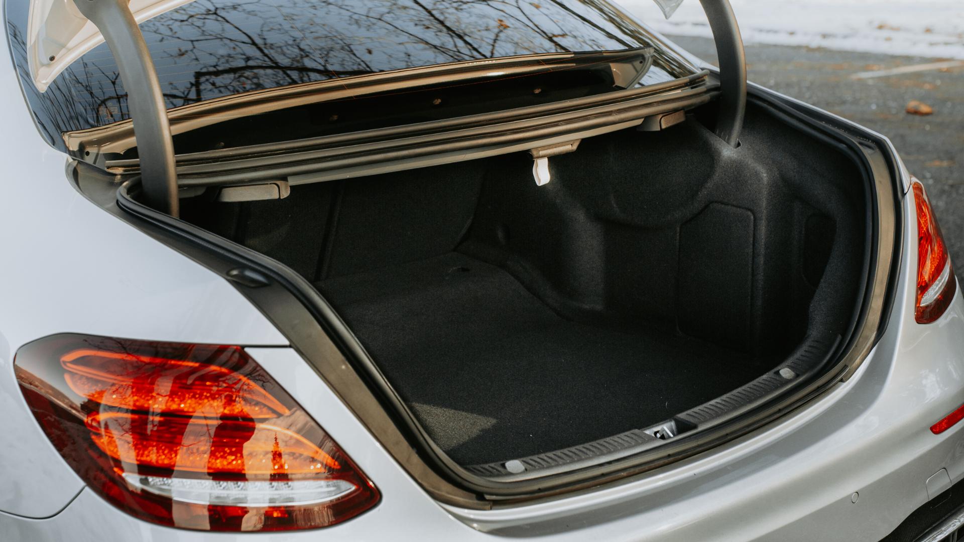 Trunk lock mechanism being worked from outside the vehicle