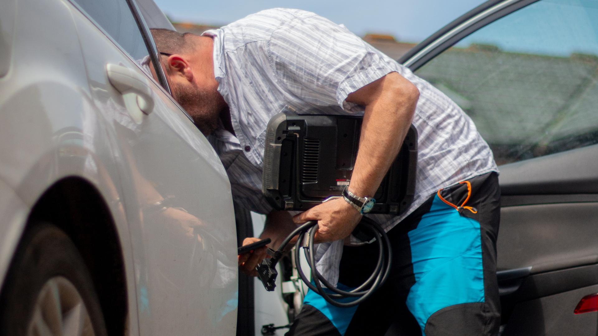 Roadside mobile locksmith service on a customer vehicle